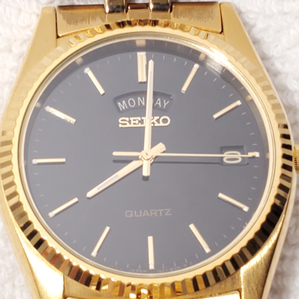 Seiko Gold Tone Case Black Dial Men’s Watch